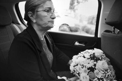 sad-widow-on-the-way-to-th-funeral-FS7X8CT