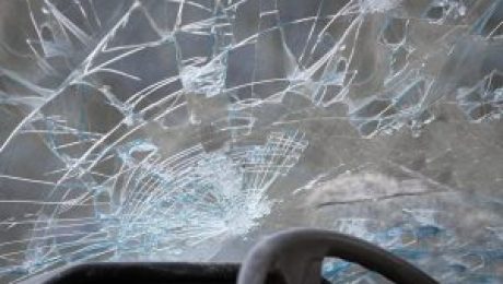 Crashed windshield Afternoon Crash Traps One on Harbeson Rd